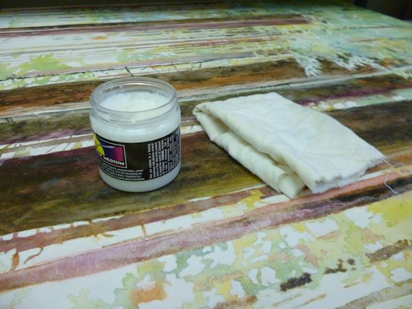 finishing a watercolor painting with wax