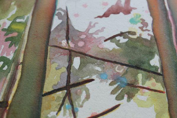 close up of drips and textures on the watercolor forest painting