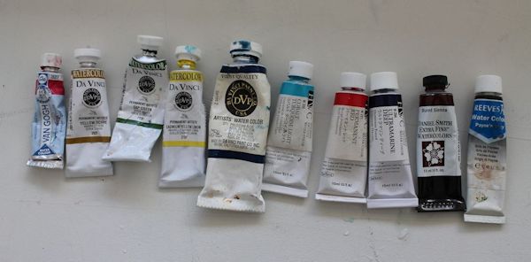 watercolor painting palette to paint a forest