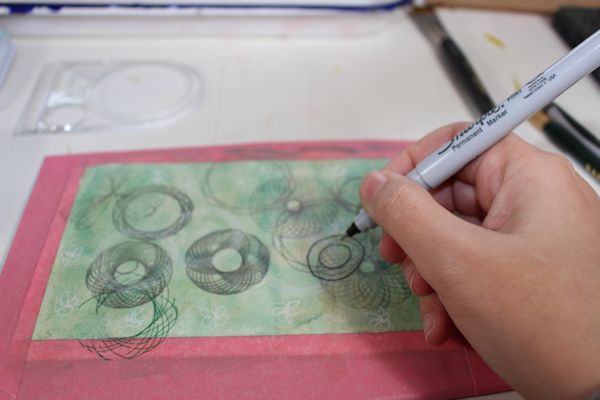 Spirograph drawing on your postcardbackground