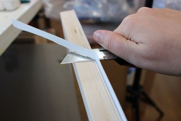 cutter to trim excess paper