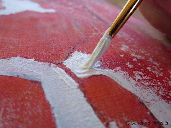 painting the negative space with white acrylic