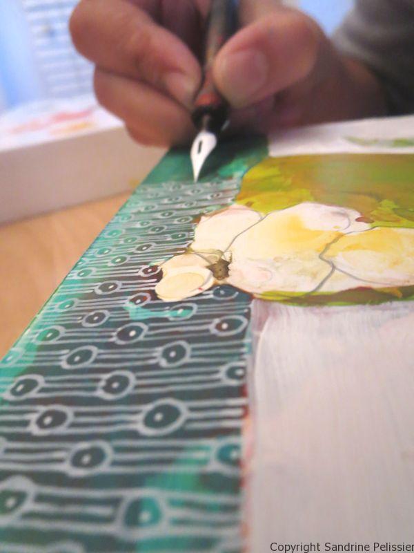 A series of three mixed media flowers on yupo paper