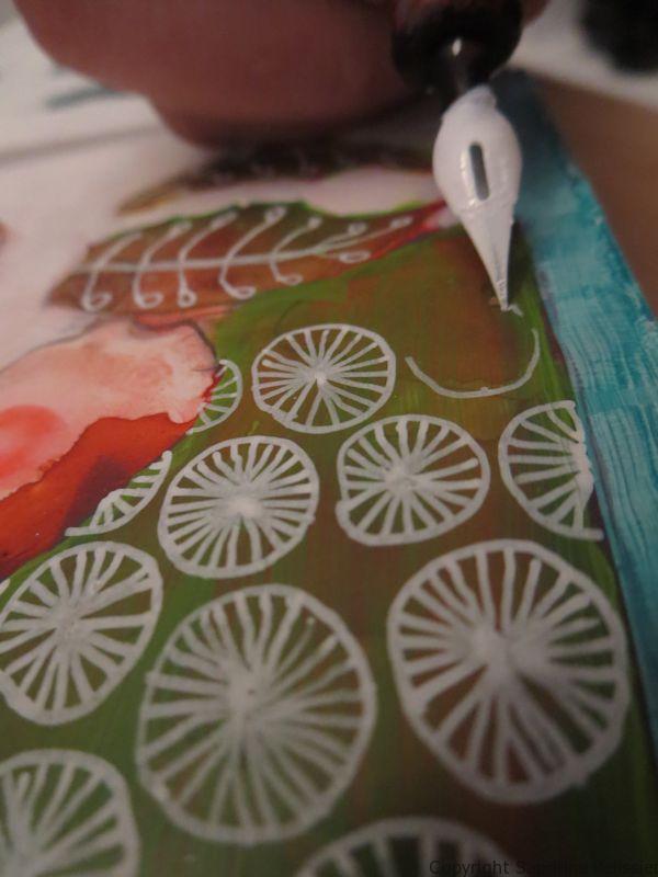 A series of three mixed media flowers on yupo paper