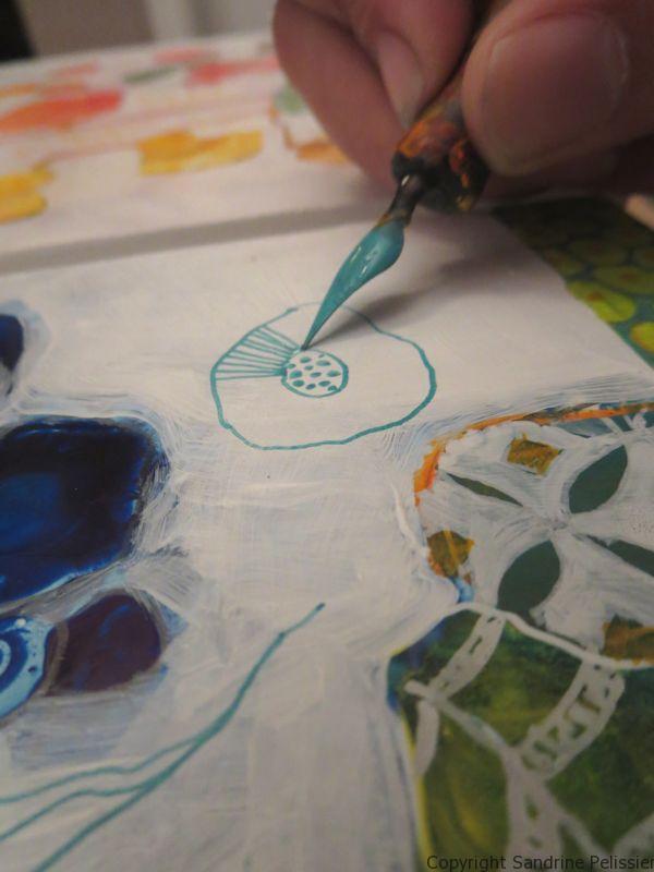 A series of three mixed media flowers on yupo paper