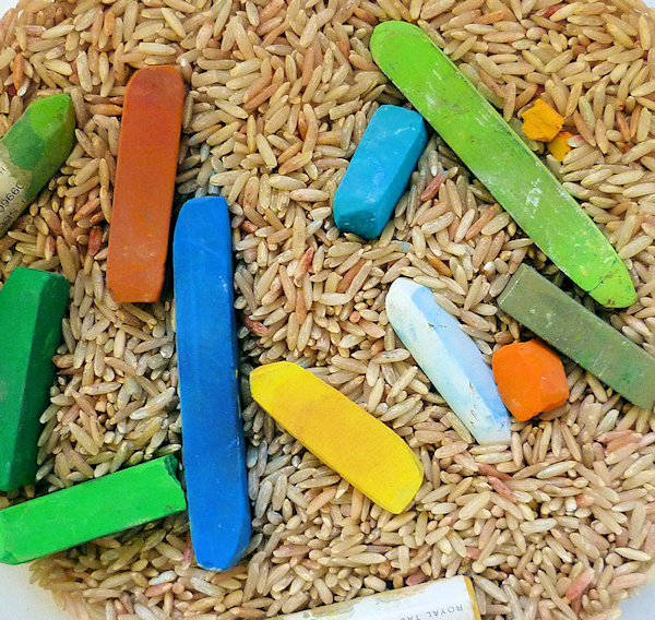 selection of dry pastels in rice for storage