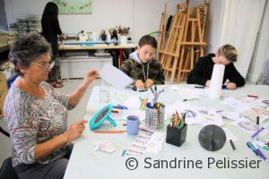 teenagers drawing self portraits