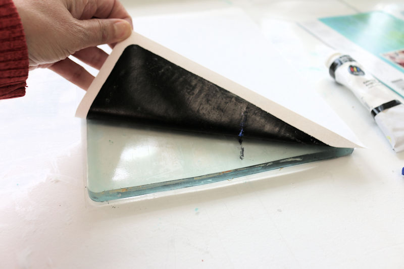 Gently lift the paper from the gelli plate.
